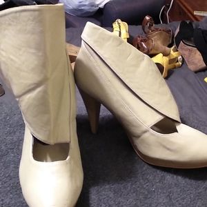 High heels/booties. Very unique. Really pretty